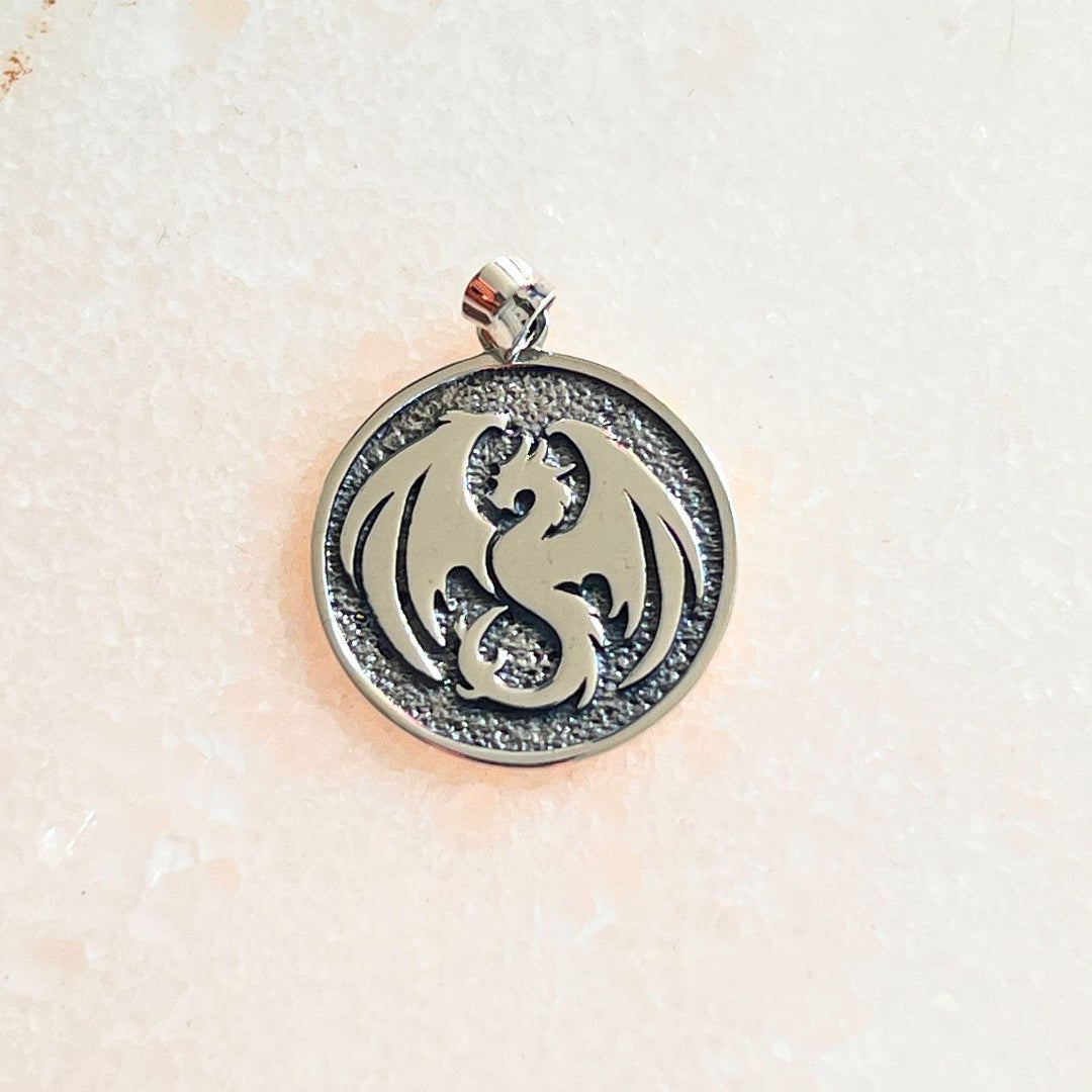 medra pendragon pendant in gold. dragon pendant in 925 silver. 