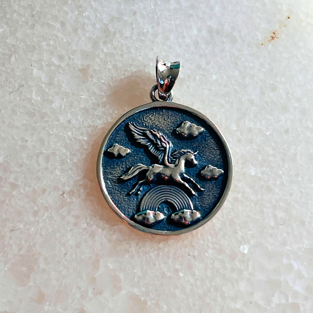 pegasass pendant with a pegasus flying through a rainbow in 925 silver.