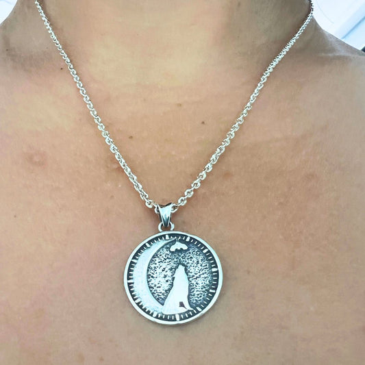seth on the moon pendant with a wolf and bat on a crescent moon in 925 silver.